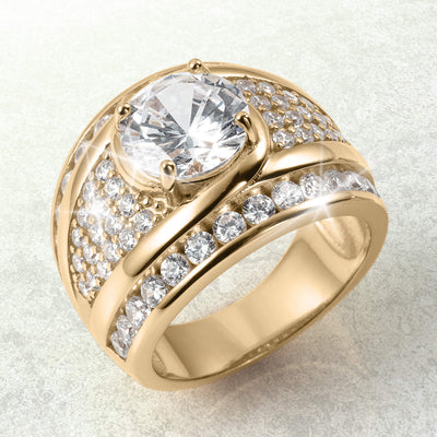 Nova Glow Ladies Ring in gold plating featuring a large central clear stone surrounded by multiple smaller sparkling stones, available Up To 75% Off Retail.