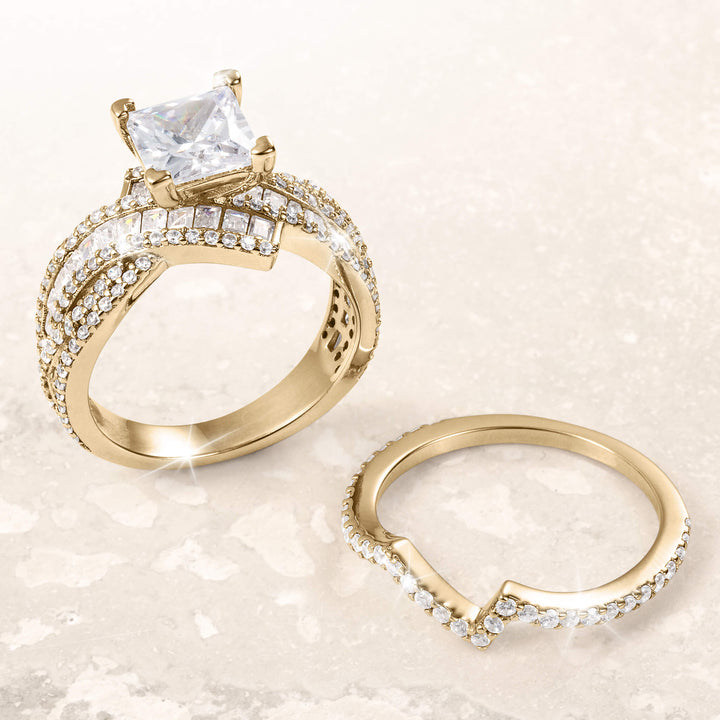 Amore Lumiere Bridal Ring set in gold with a large square-cut center stone and pavé diamond accents, showcasing exquisite craftsmanship and elegance, Up To 75% Off Retail.