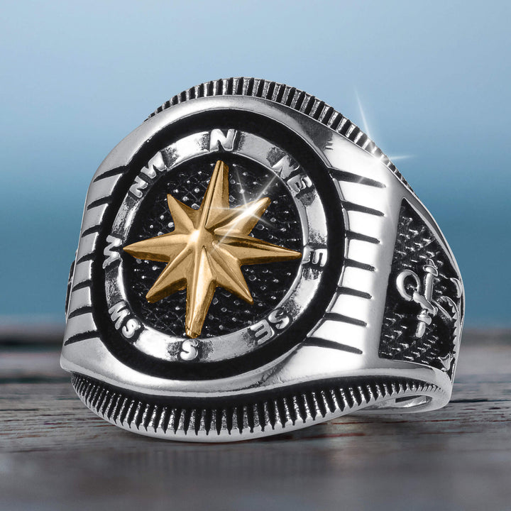 Navigator Men's Ring in sterling silver with two-tone plating, featuring a gold-tone compass rose design and intricate side detailing, offered Up To 75% Off Retail.