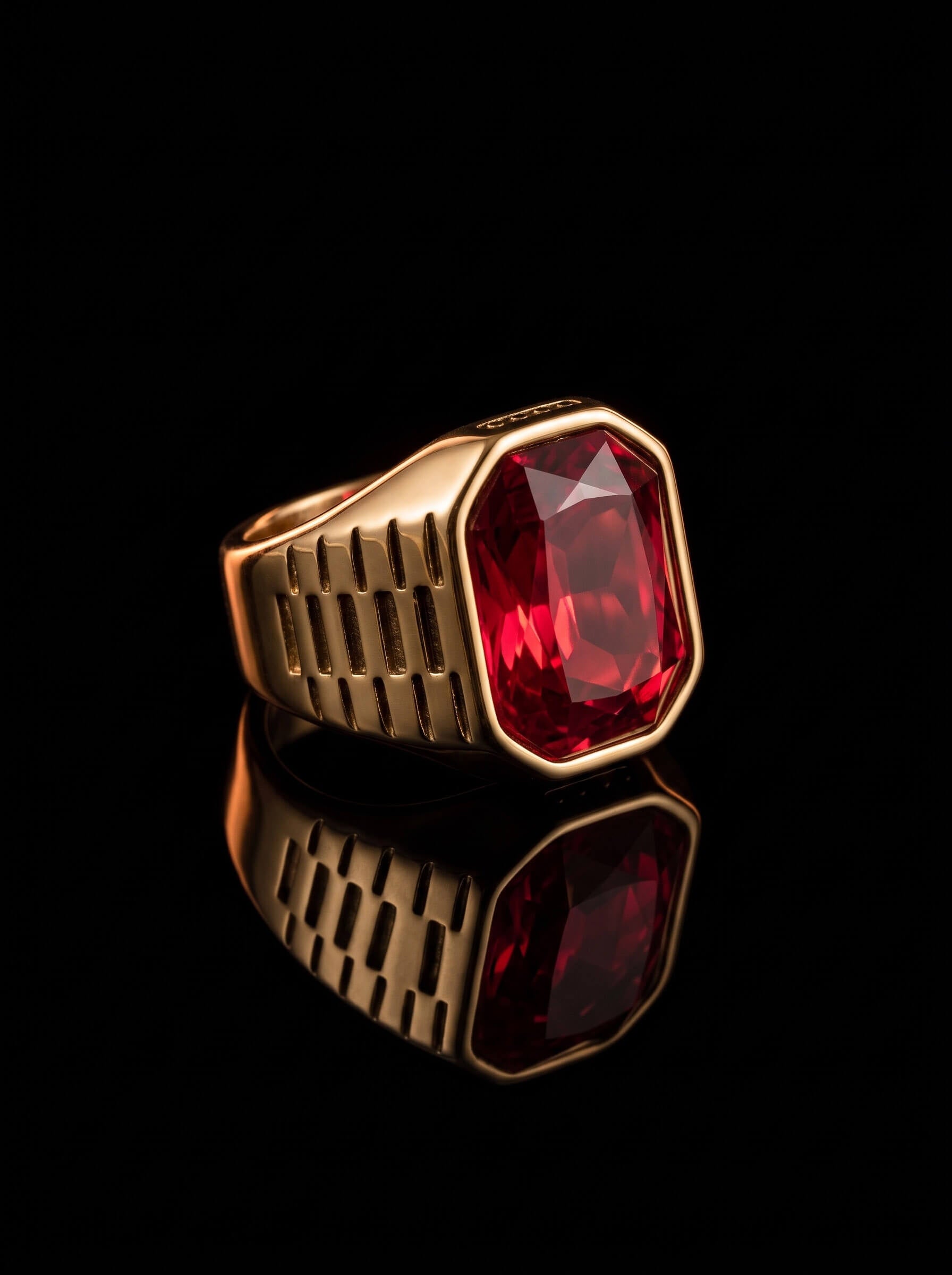Imperial Scarlet Ring featuring a bold faceted scarlet gemstone in a gold tone signet setting with sculpted details and a dramatic reflective finish Up To 75% Off Retail
