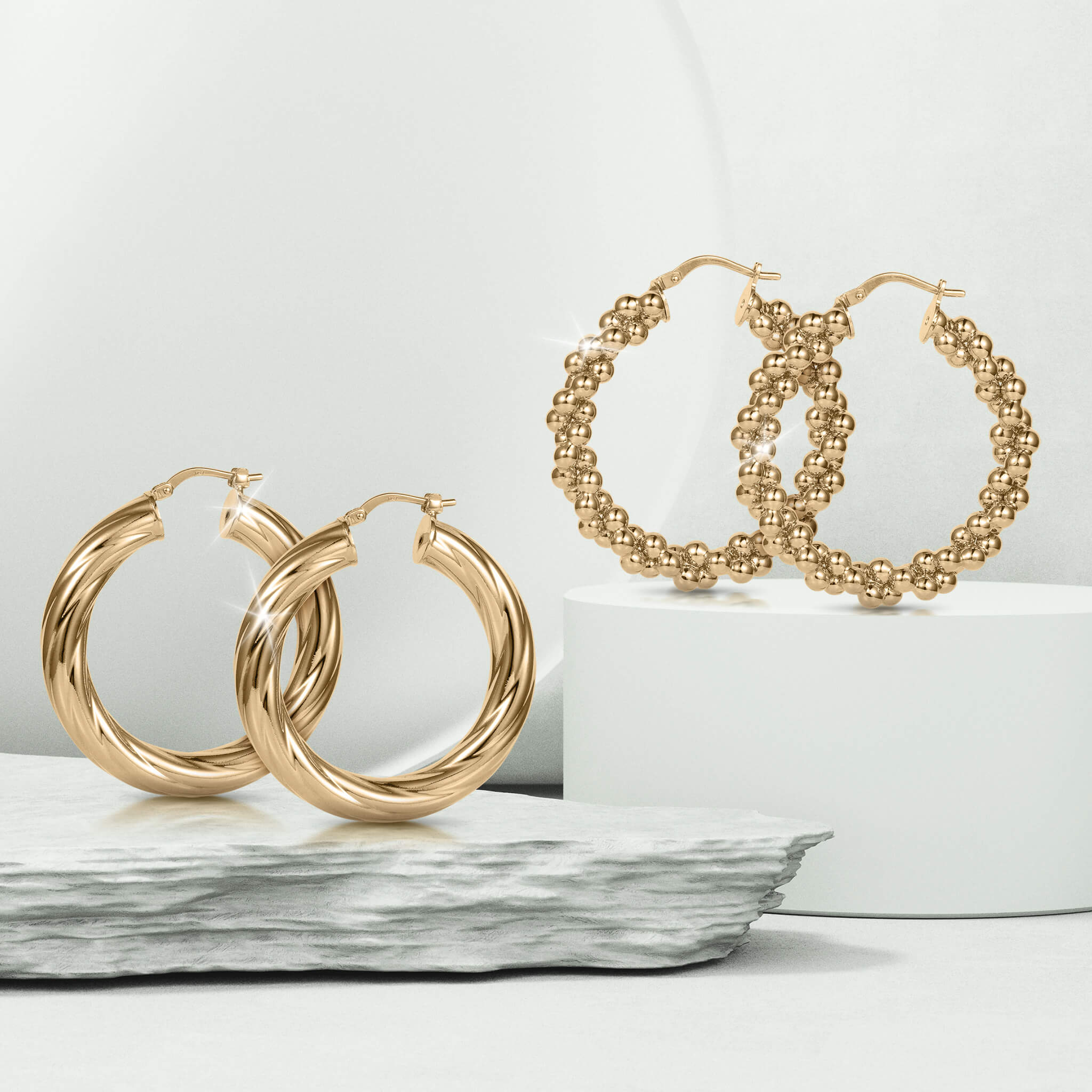 Roma Luxe Hoop Earrings Set featuring two pairs of gold-plated bronze hoop earrings for women, combining smooth twisted and textured beaded designs, Up To 75% Off Retail.