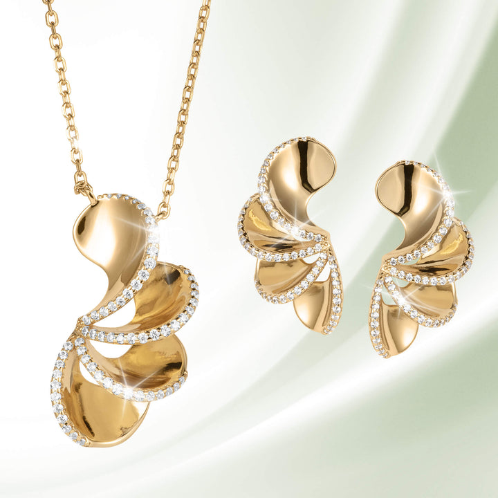 Elegant gold-tone pendant necklace and matching earrings with sparkling crystal accents from the Arianna Collection, available Up To 75% Off Retail.