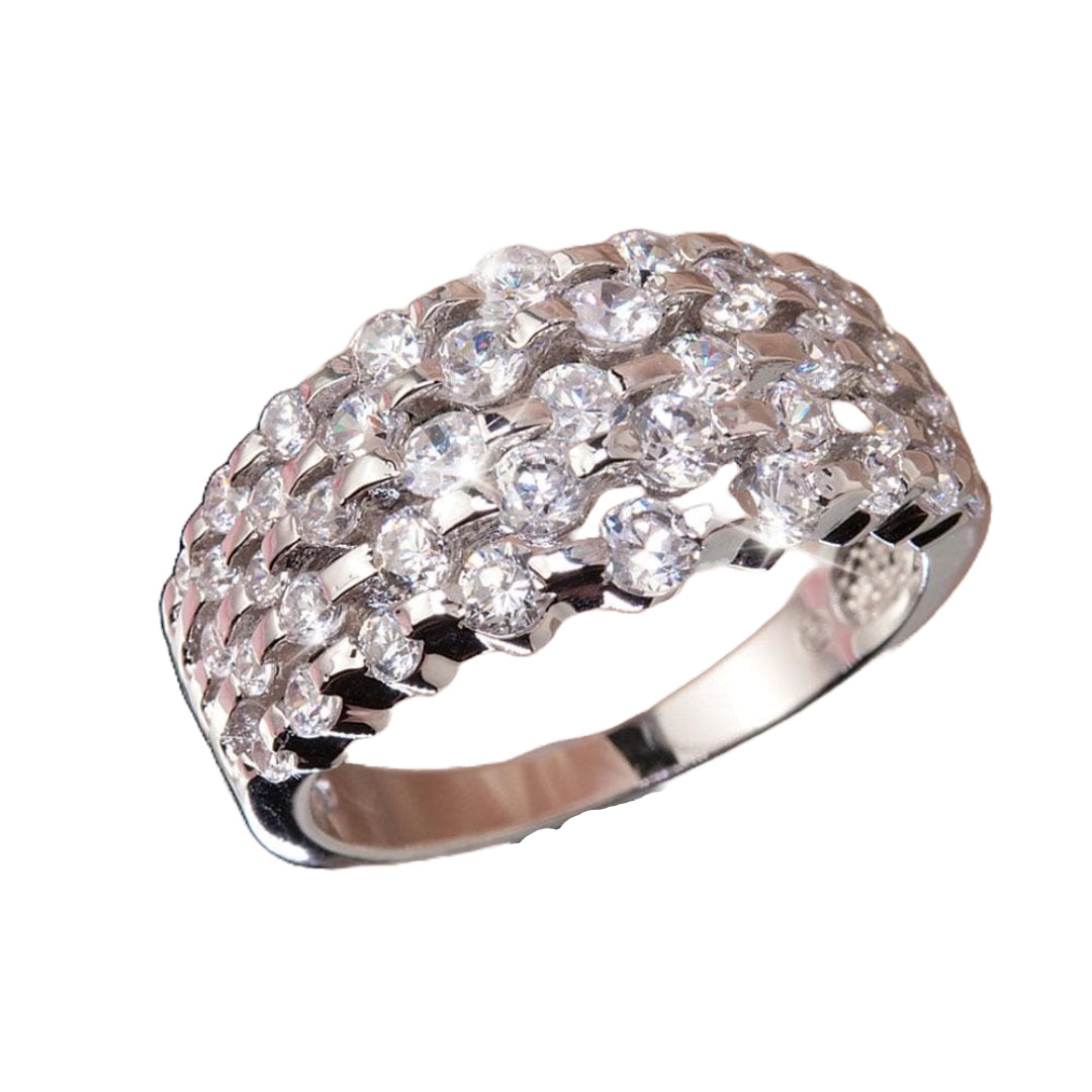 Amelia Ring featuring a sterling silver band with rhodium plating, adorned with multiple sparkling stones, designed for women’s jewelry collections.