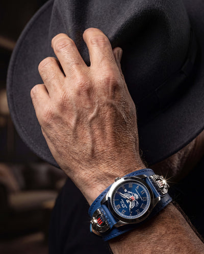 Patriot 250 Years Blue Limited Edition Watch on male wrist with stainless steel case and blue dial, styled with leather strap, Up To 75% Off Retail.