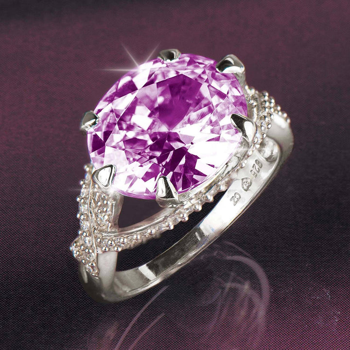 Flawless Thorn Rhodium Ring featuring a large faceted pink gemstone set in sterling silver with rhodium plating and intricate detailing designed for female jewelry lovers.