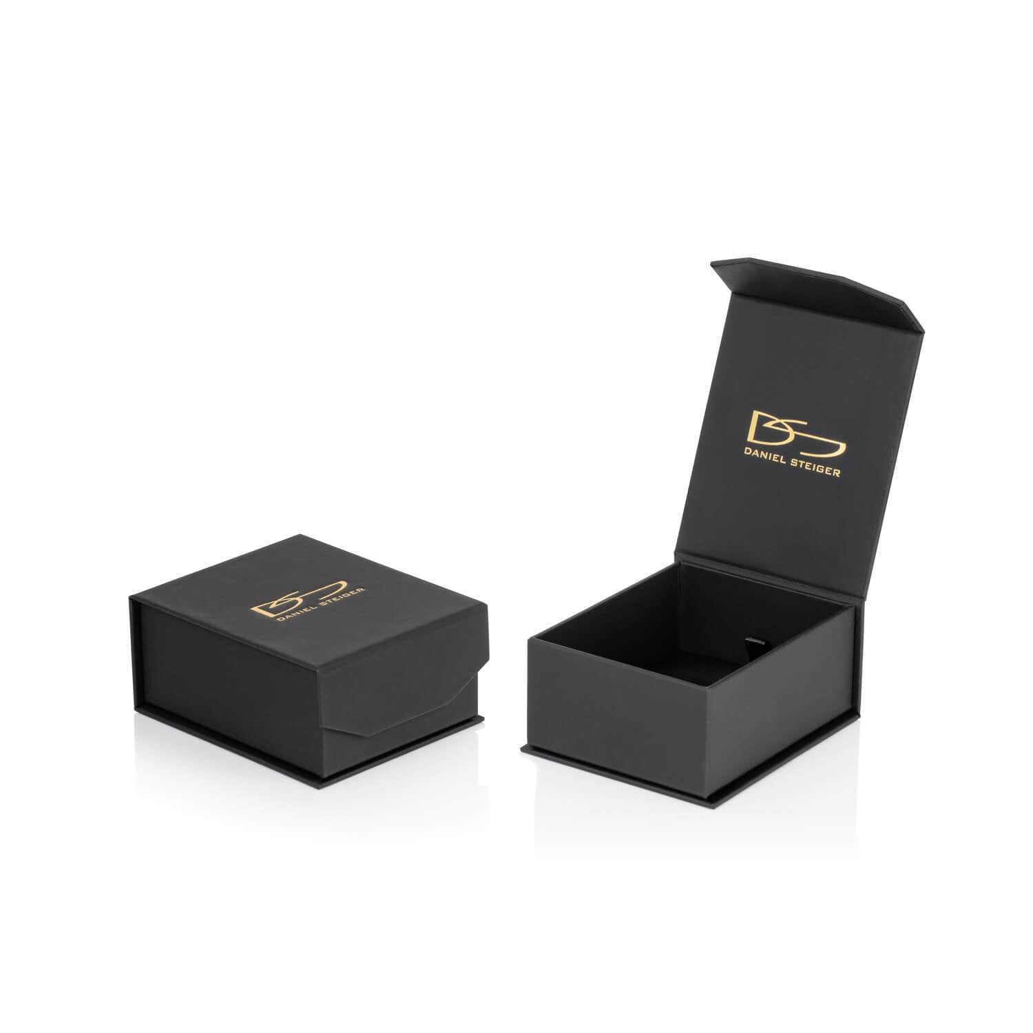 Black elegant jewelry box with gold Daniel Steiger logo, designed to hold the Fly Away Brooch Pink made of sterling silver with rhodium plating for women.