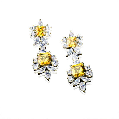 Pair of Chateau Bliss Earrings for female, crafted in sterling silver with yellow square gemstones surrounded by clear sparkling crystals in floral design.