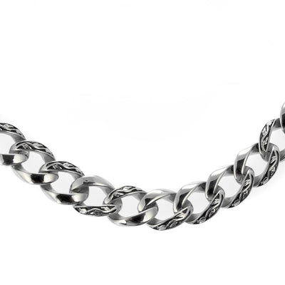 Close-up of a sturdy stainless steel chain link segment from the Enigma Steel Necklace designed for male jewelry enthusiasts.