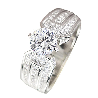 5th Avenue Rhodium Ring featuring a sterling silver band with intricate detailing and a large round clear gemstone centerpiece designed for women’s jewelry.
