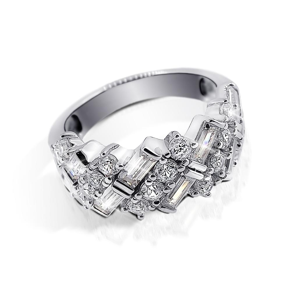 Elegant Ascot Ring for female in sterling silver with rhodium plating, featuring an intricate design with sparkling baguette and round-cut stones, perfect jewelry choice.