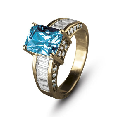 Sonora Dress Ring featuring a large rectangular blue stone set in sterling silver with baguette and round cut clear stones along the band, designed for female jewelry lovers.