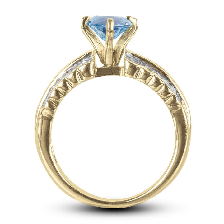 Carman Marquise Ring featuring a gold-plated stainless steel band with a prominent blue marquise-cut gemstone, designed for women’s elegant jewelry collections.