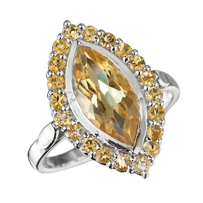 Citrine Solaris Ring featuring a marquise-cut citrine center stone surrounded by smaller round citrines, set in sterling silver for a dazzling jewelry statement.