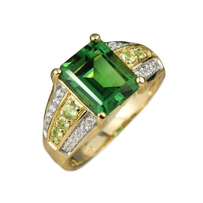 Belvedere Ladies Ring featuring a sterling silver band with gold plating, set with a large rectangular green gemstone and accented by smaller diamonds and light green stones.