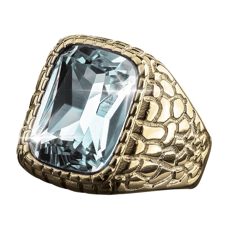 Glacier Ice Ring featuring a large pale blue gemstone set in a gold plated stainless steel band with textured detailing, designed for men’s jewelry collections.