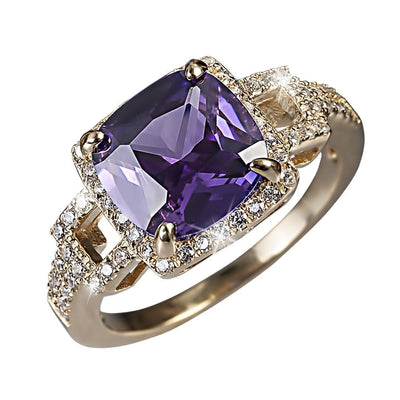 Radiant Orchid Ring featuring a large radiant purple gemstone set in sterling silver with gold plating and accented by sparkling clear stones, designed for women’s jewelry.