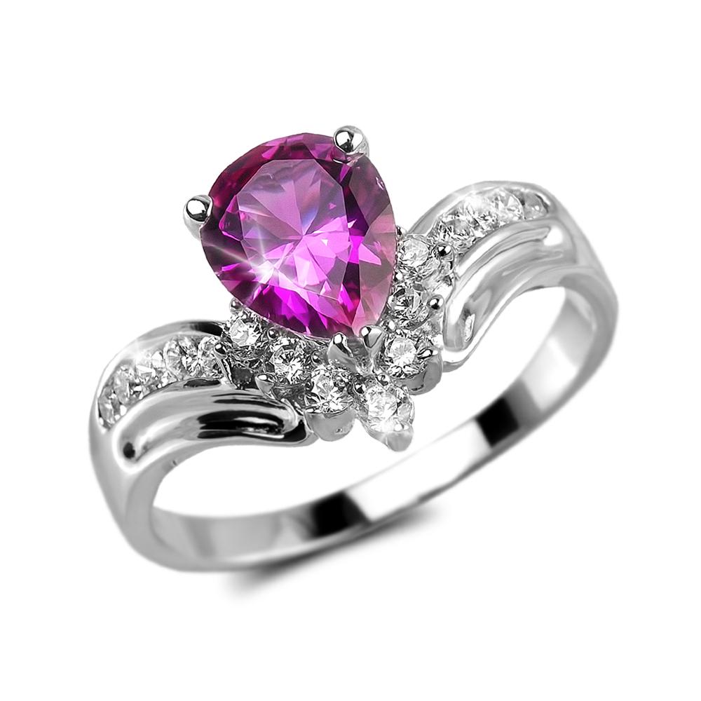 Sterling silver Rosa Primera Ring featuring a pear-shaped vibrant pink gemstone accented with sparkling clear stones and rhodium plating for a polished finish.