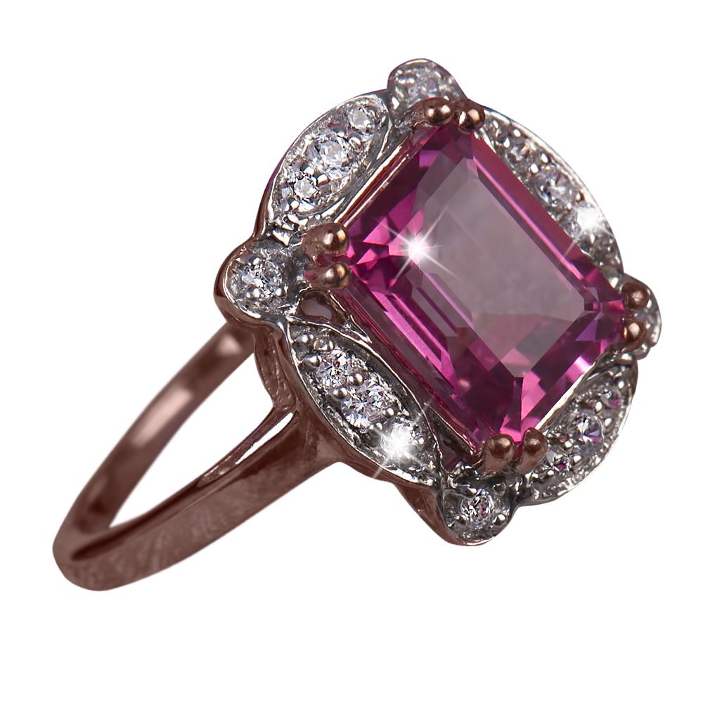 Lille Tourmaline Ring featuring a vibrant pink tourmaline centerpiece set in sterling silver with rose gold plating, accented by sparkling white stones for elegant female jewelry.